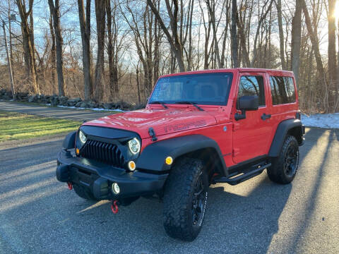 2013 Jeep Wrangler for sale at Lou Rivers Used Cars in Palmer MA