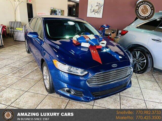 2016 Ford Fusion for sale at Amazing Luxury Cars in Snellville GA