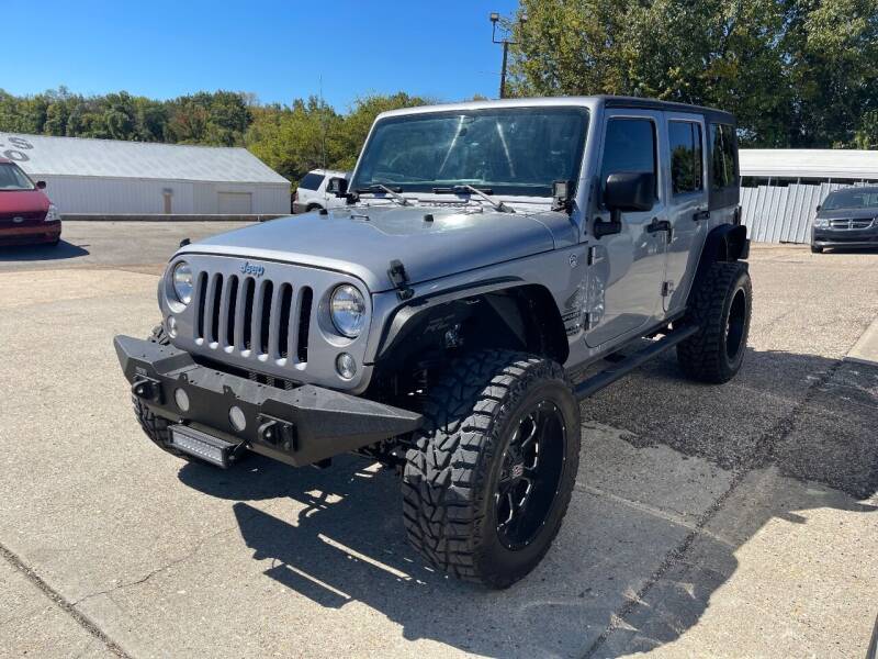 2015 Jeep Wrangler Unlimited for sale at Greg's Auto Sales in Poplar Bluff MO