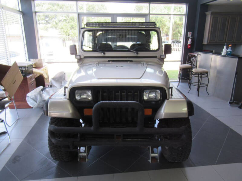1988 Jeep Wrangler for sale at Lone Star Auto Center in Spring TX