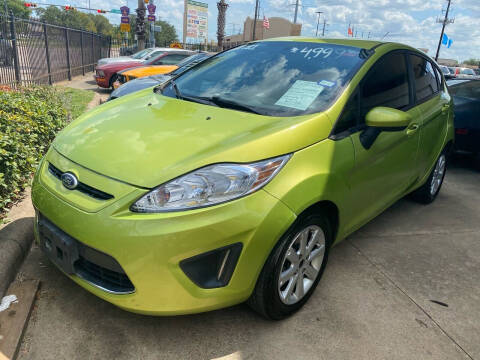 2011 Ford Fiesta for sale at Buy-Fast Autos in Houston TX