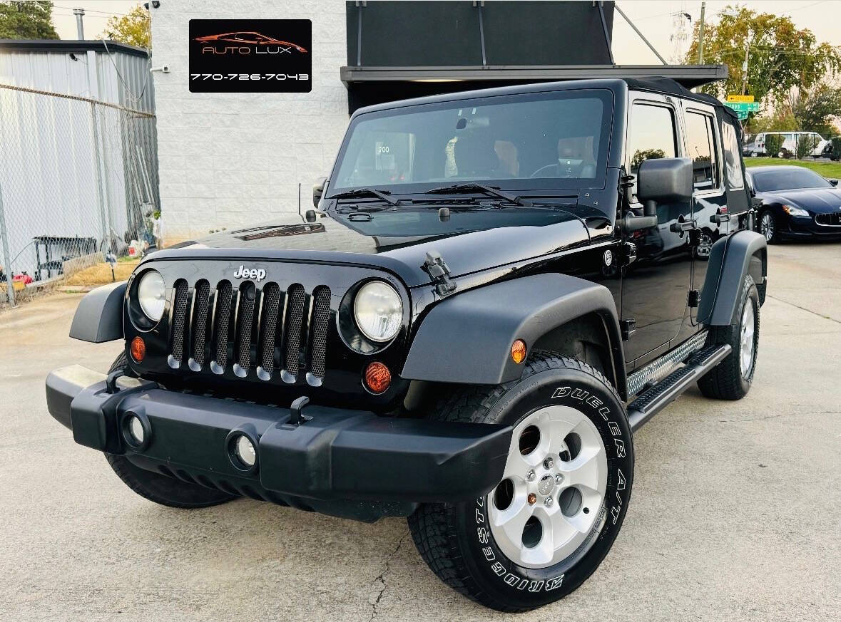 2012 Jeep Wrangler Unlimited for sale at AUTO LUX INC in Marietta, GA