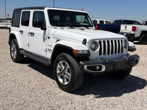 2020 Jeep Wrangler Unlimited for sale at BERKENKOTTER MOTORS in Brighton CO