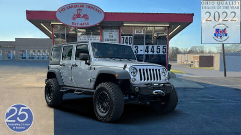 2014 Jeep Wrangler Unlimited for sale at The Carriage Company in Lancaster OH