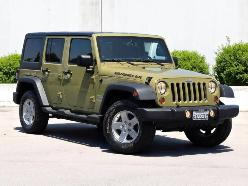 Used 2013 Jeep Wrangler Unlimited Sport with VIN 1C4BJWDG6DL571898 for sale in San Diego, CA