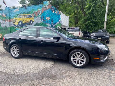 2012 Ford Fusion for sale at SHOWCASE MOTORS LLC in Pittsburgh PA