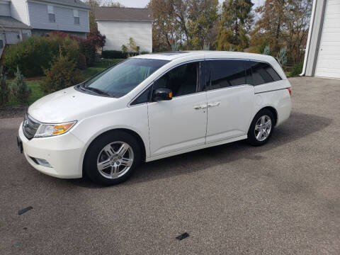 2012 Honda Odyssey for sale at Exclusive Automotive in West Chester OH