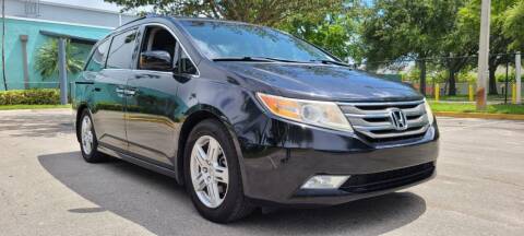 2012 Honda Odyssey for sale at HIGH PERFORMANCE MOTORS in Hollywood FL