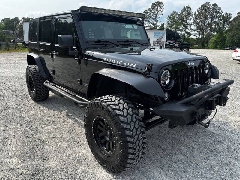 2014 Jeep Wrangler Unlimited for sale at Gwinnett Luxury Motors in Buford GA