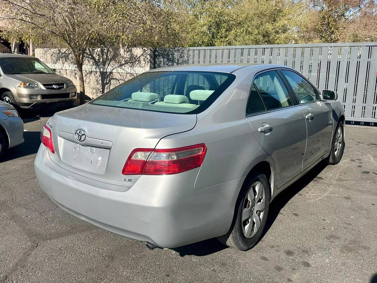 2007 Toyota Camry for sale at HUDSONS AUTOS in Gilbert, AZ