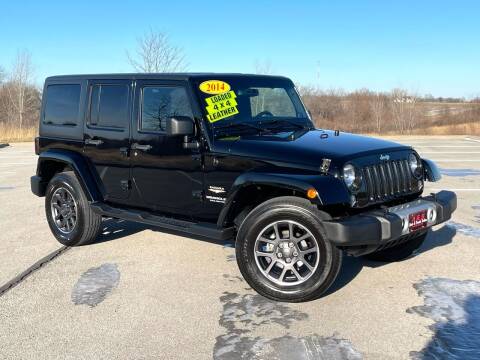 2014 Jeep Wrangler Unlimited for sale at A & S Auto and Truck Sales in Platte City MO