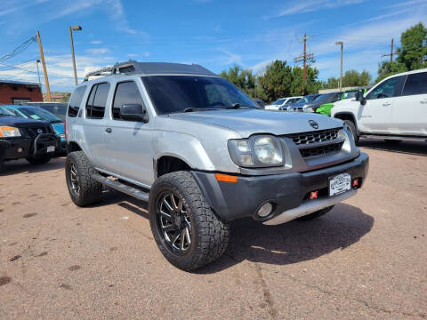 2004 Nissan Xterra for sale at BERKENKOTTER MOTORS in Brighton CO