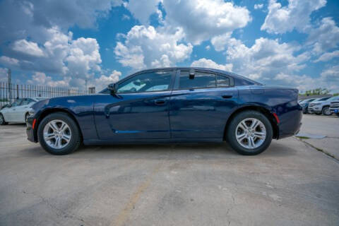 2015 Dodge Charger for sale at Trinity Auto Sales Group in Dallas TX