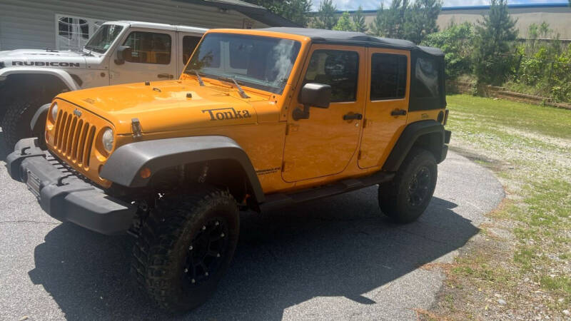 2012 Jeep Wrangler Unlimited for sale at AMG Automotive Group in Cumming GA