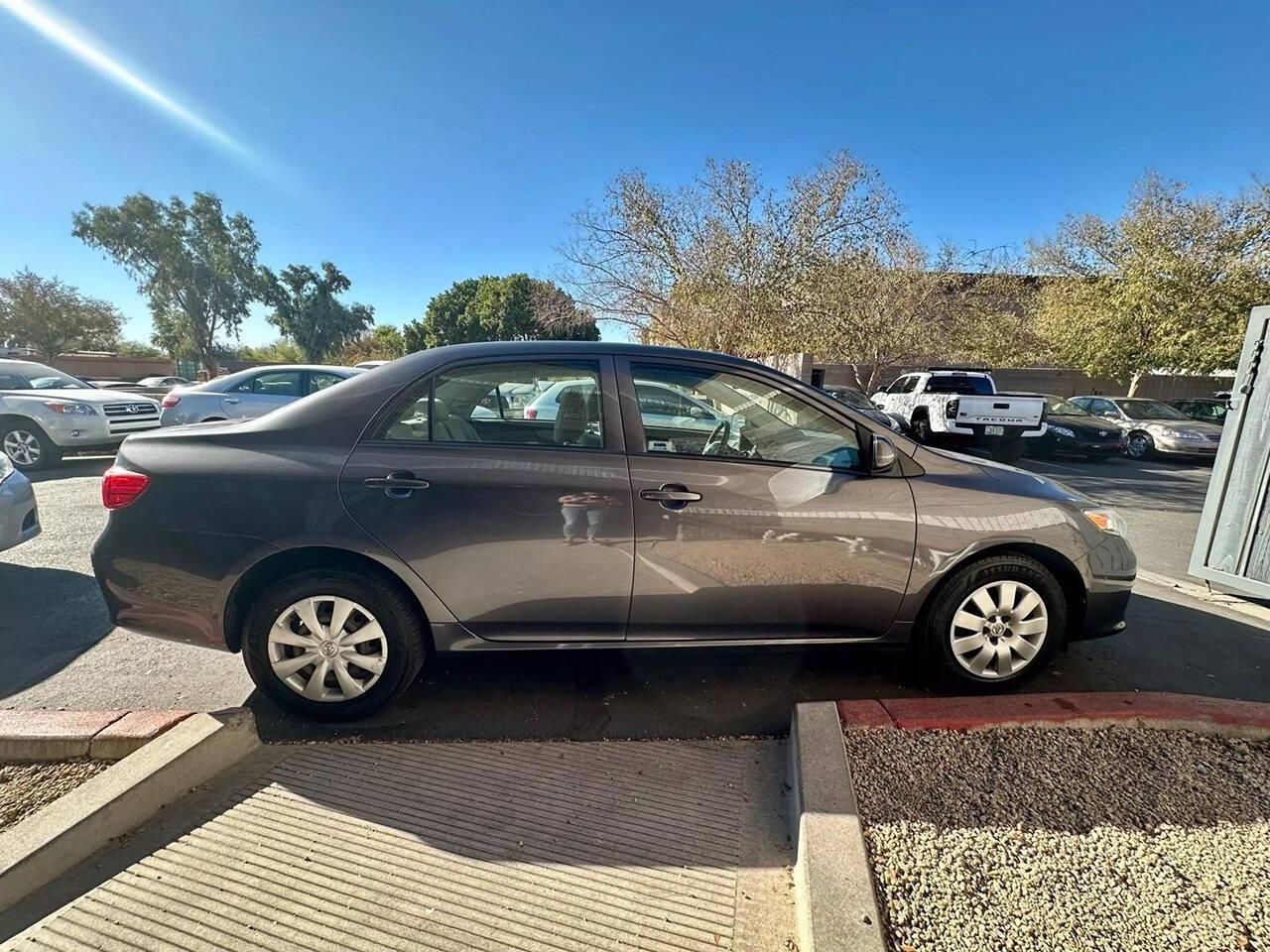 2009 Toyota Corolla for sale at HUDSONS AUTOS in Gilbert, AZ