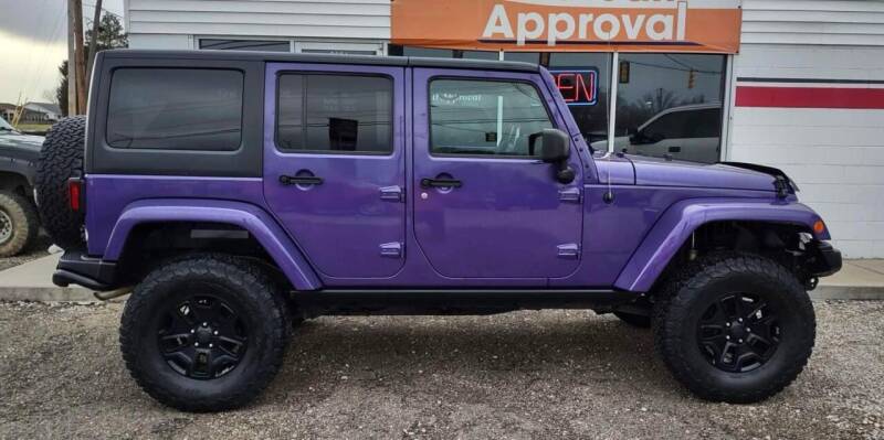 2016 Jeep Wrangler Unlimited for sale at MARION TENNANT PREOWNED AUTOS in Parkersburg WV