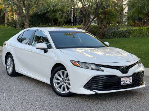 2020 Toyota Camry for sale at MILLENNIUM MOTORS in Van Nuys CA