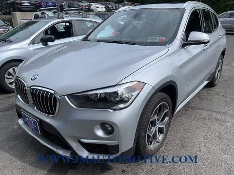2018 BMW X1 for sale at J & M Automotive in Naugatuck CT