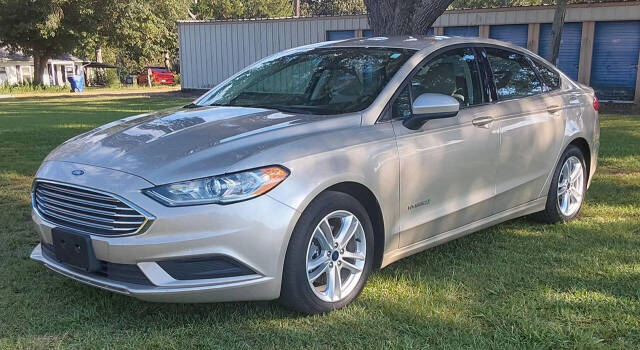 2018 Ford Fusion Hybrid for sale at Theron's Auto Sales, LLC in Deridder, LA