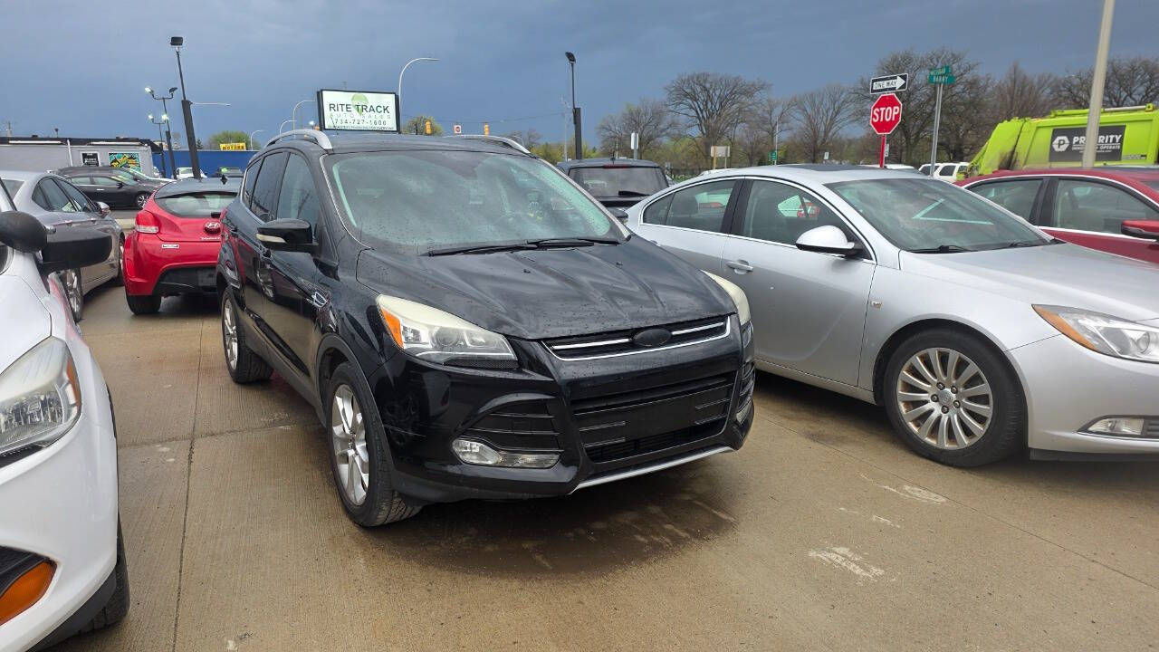 Black 2016 Ford Escape Titanium Titanium 4dr SUV 1