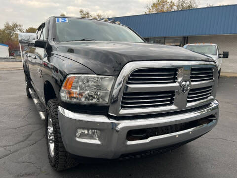 https://cdn05.carsforsale.com/00a11e3c5fa4bad617a71c00ebe929eed6/480x360/2013-ram-2500-big-horn-4x4-4dr-mega-cab-6-3-ft-sb-pickup.jpg