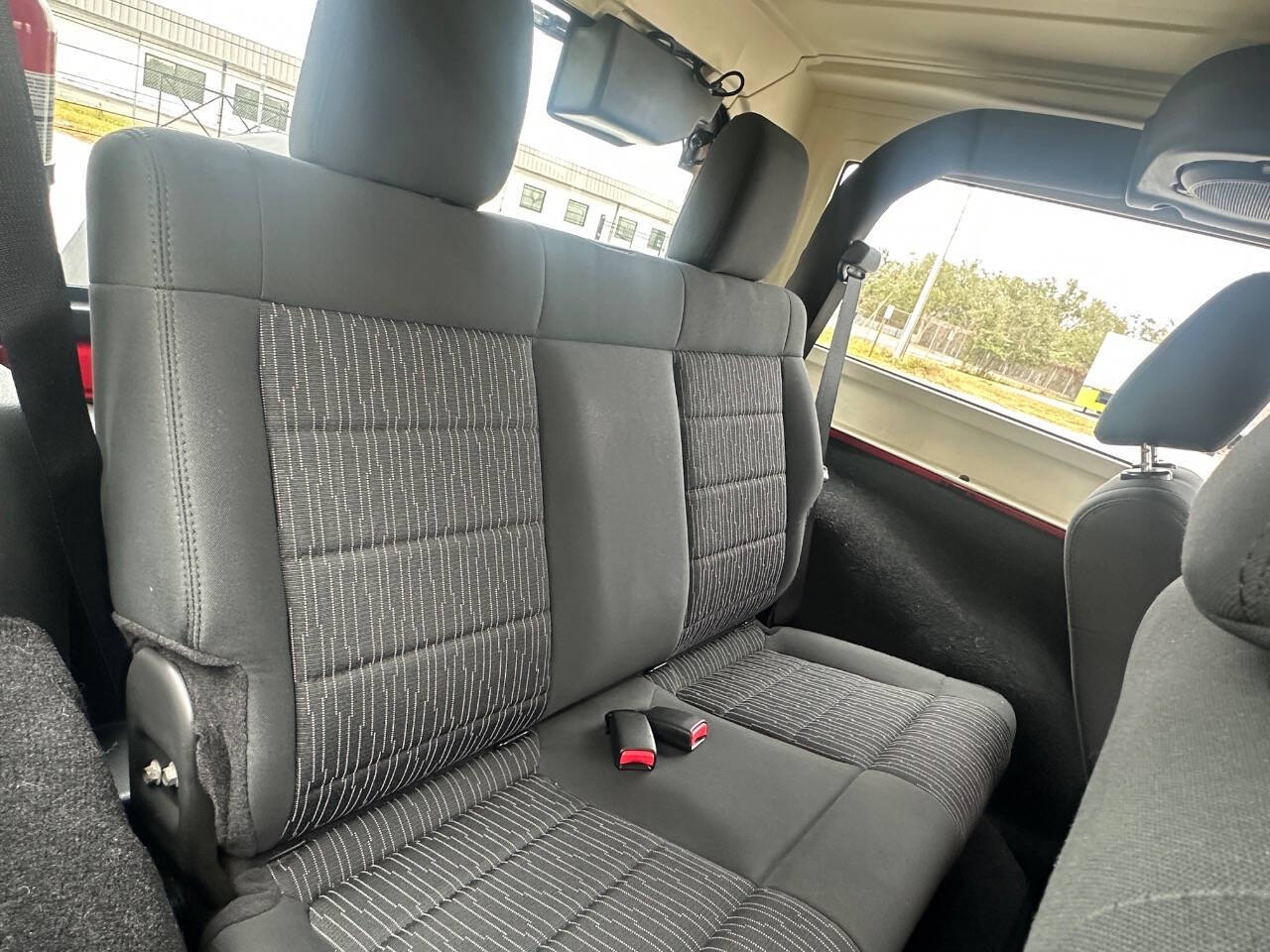 2011 Jeep Wrangler for sale at Rubi Motorsports in Sarasota, FL