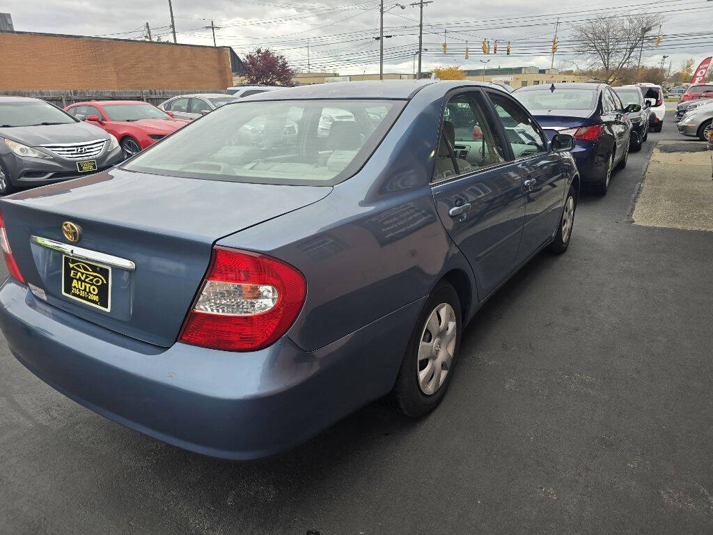 2003 Toyota Camry for sale at ENZO AUTO in Parma, OH