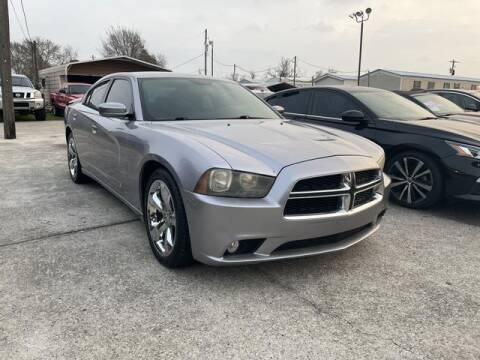 2013 Dodge Charger for sale at CE Auto Sales in Baytown TX