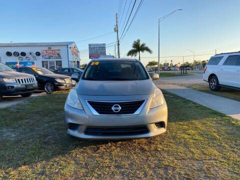 2014 Nissan Versa for sale at ONYX AUTOMOTIVE, LLC in Largo FL