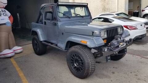 1988 Jeep Wrangler for sale at KAM Motor Sales in Dallas TX