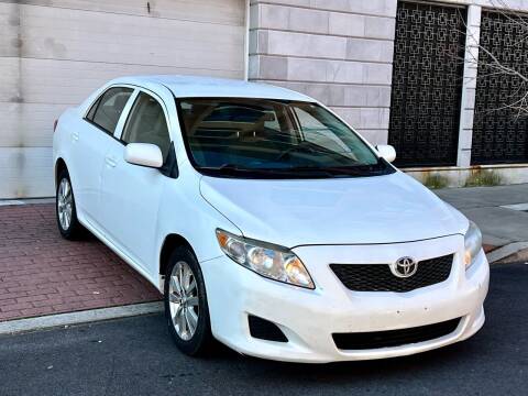 2010 Toyota Corolla for sale at King Of Kings Used Cars in North Bergen NJ