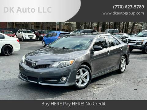 2014 Toyota Camry for sale at DK Auto LLC in Stone Mountain GA