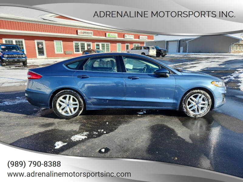 2019 Ford Fusion Hybrid for sale at Adrenaline Motorsports Inc. in Saginaw MI