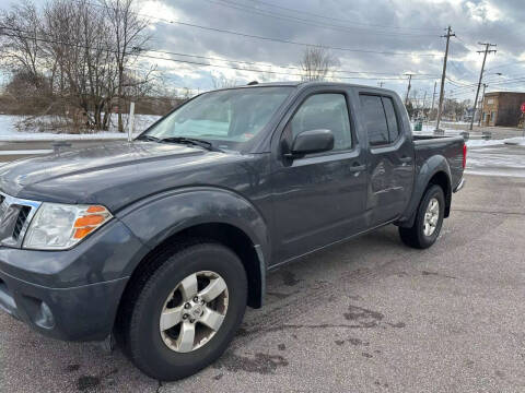 2013 Nissan Frontier for sale at Glizzy Auto Sales in Barberton OH