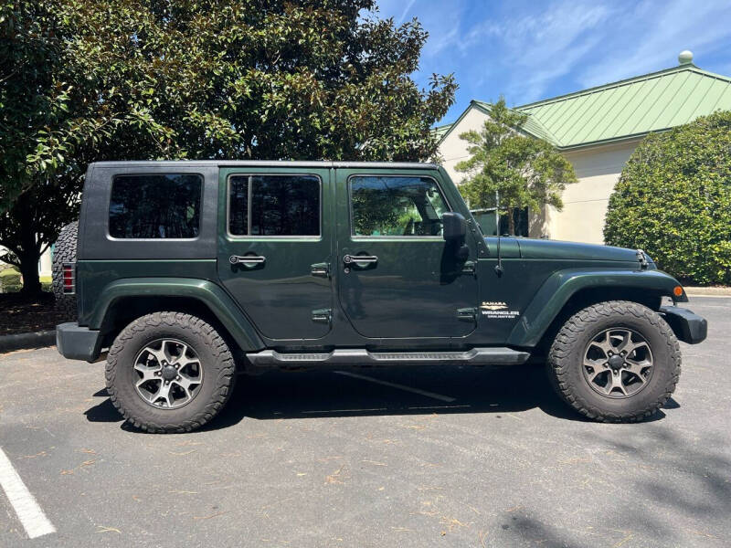 2010 Jeep Wrangler Unlimited for sale at Greystone Motors in Birmingham AL