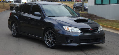 2012 Subaru Impreza for sale at BOOST MOTORS LLC in Sterling VA