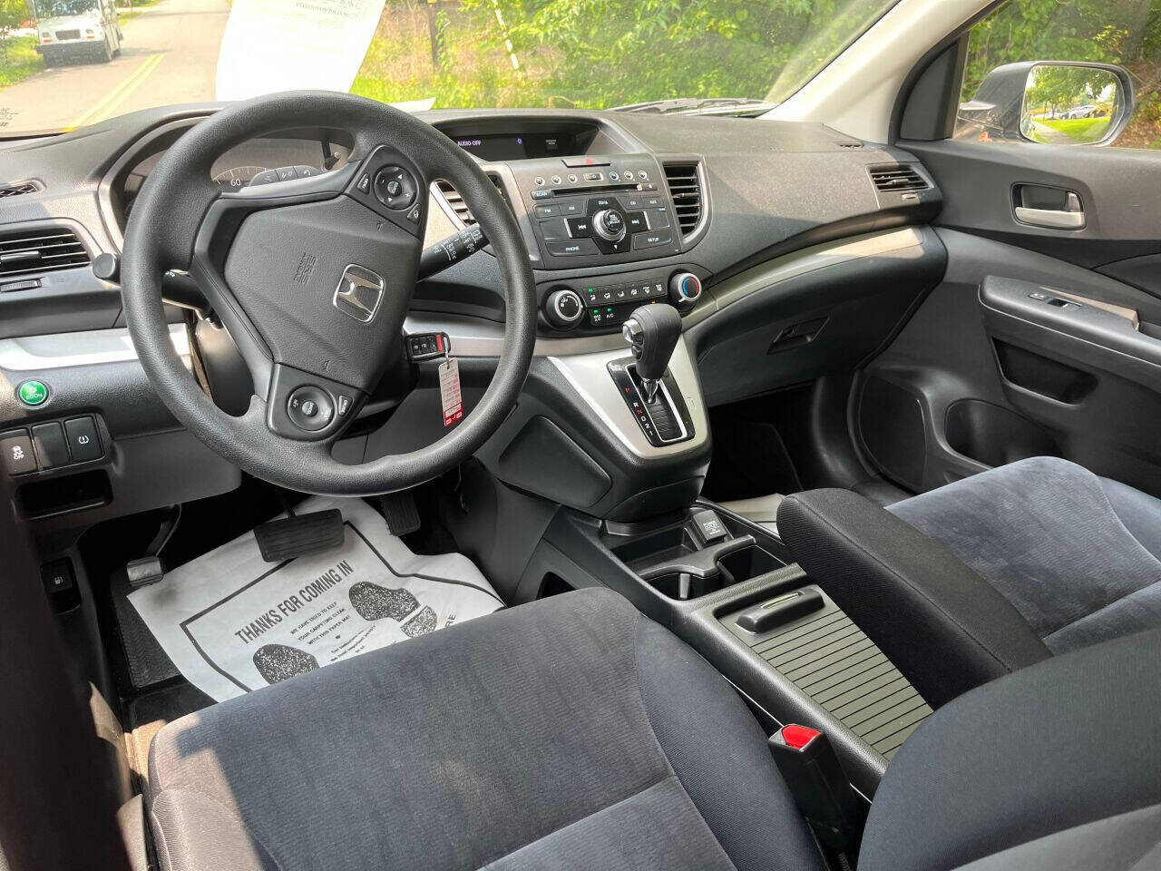 Preowned 2014 HONDA CR-V LX AWD 4dr SUV for sale by The Auto Finders Car Dealership of Durham in Durham, NC