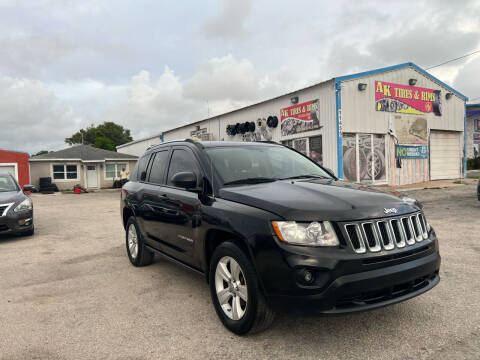2011 Jeep Compass for sale at ONYX AUTOMOTIVE, LLC in Largo FL