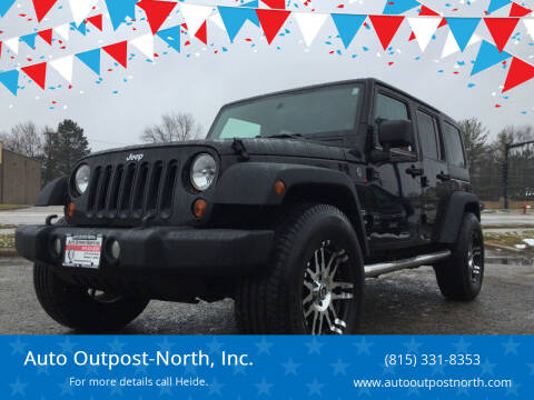 2011 Jeep Wrangler Unlimited for sale at Auto Outpost-North, Inc. in McHenry IL