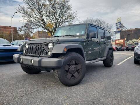 2015 Jeep Wrangler Unlimited for sale at Sonias Auto Sales in Worcester MA