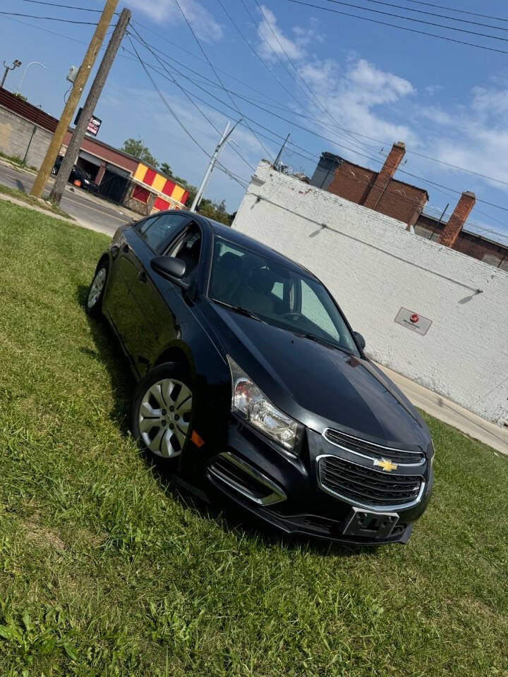 2015 Chevrolet Cruze for sale at H & H AUTO GROUP in Detroit, MI