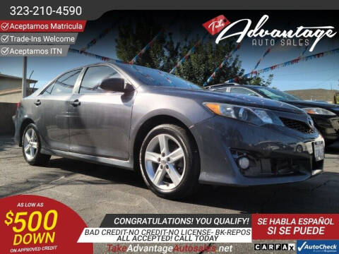 2014 Toyota Camry for sale at ADVANTAGE AUTO SALES INC in Bell CA