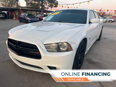 2013 Dodge Charger for sale at Kid Motors Inc in El Paso TX