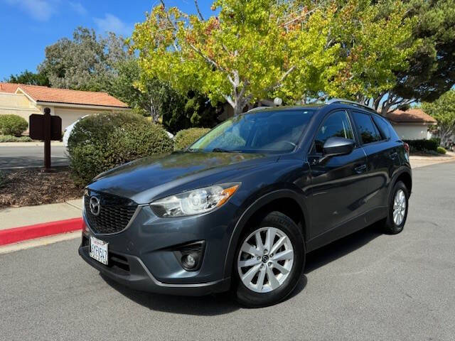 2013 Mazda CX-5 for sale at RGM Auto Sales in San Diego, CA