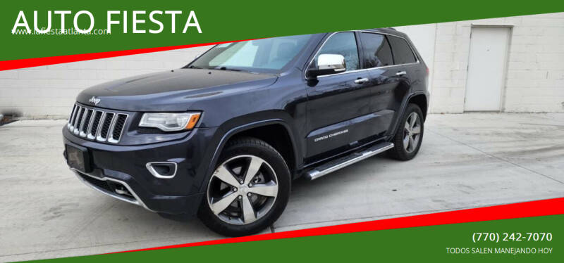 2014 Jeep Grand Cherokee for sale at AUTO FIESTA in Norcross GA