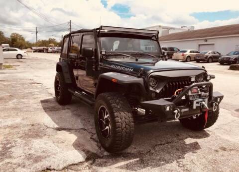 2014 Jeep Wrangler Unlimited for sale at New Tampa Auto in Tampa FL