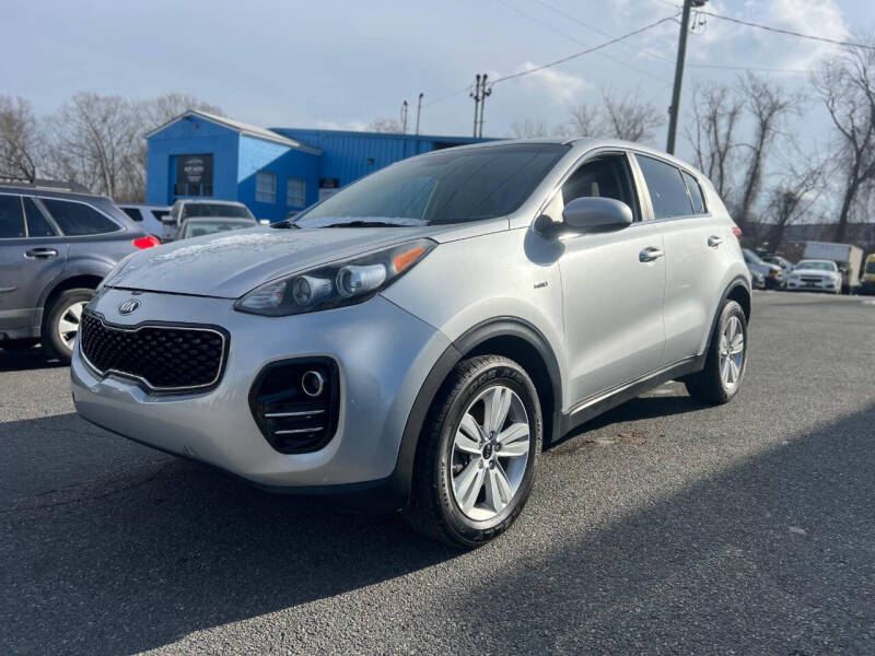 2018 Kia Sportage for sale at MGM Auto Group in Framingham MA