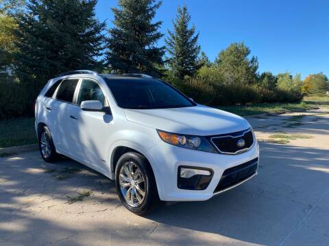 2011 Kia Sorento for sale at QUEST MOTORS in Englewood CO