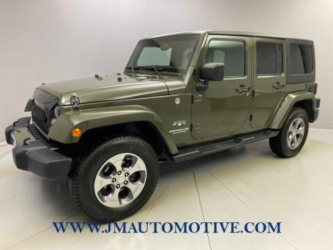 2016 Jeep Wrangler Unlimited for sale at J & M Automotive in Naugatuck CT