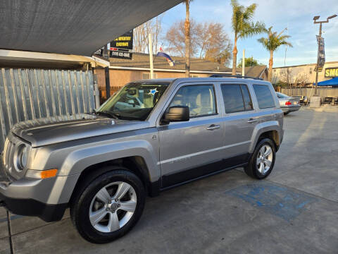 2015 Jeep Patriot for sale at E and M Auto Sales in Bloomington CA
